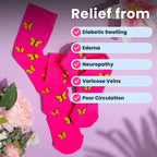 pink compression socks a with butterfly pattern with flowers flatlay