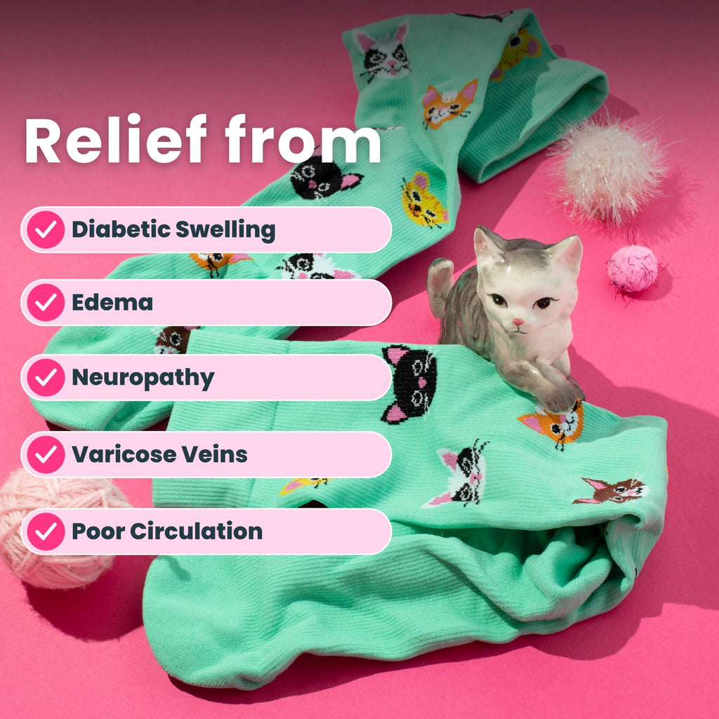 Light green knee high compression socks with cat design and cat toy