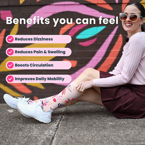 model sitting wearing Floral-patterned compression socks