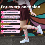 model standing showing off Floral-patterned compression socks