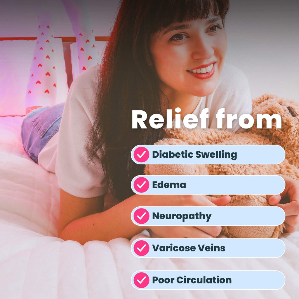 Woman wearing white compression socks with red heart patterns on bed with teddy