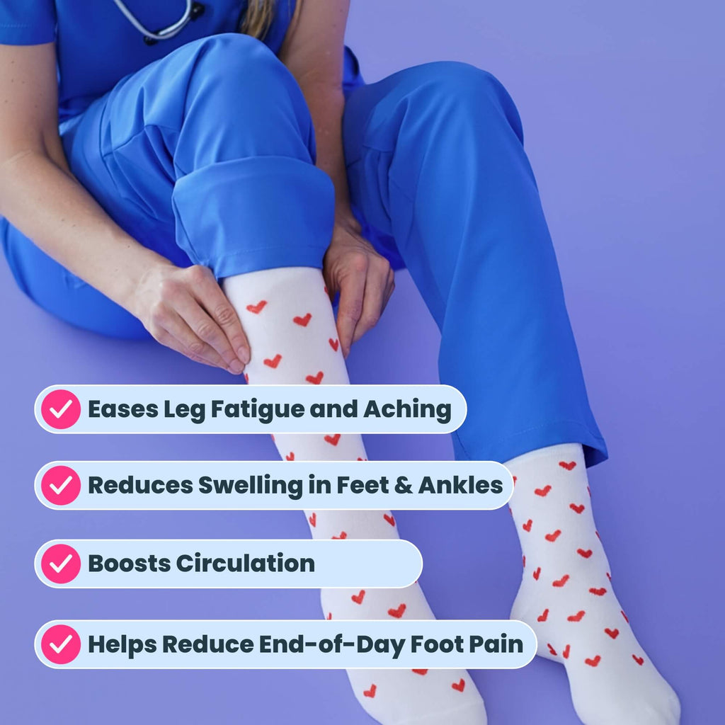 Nurse wearing white compression socks with red heart patterns