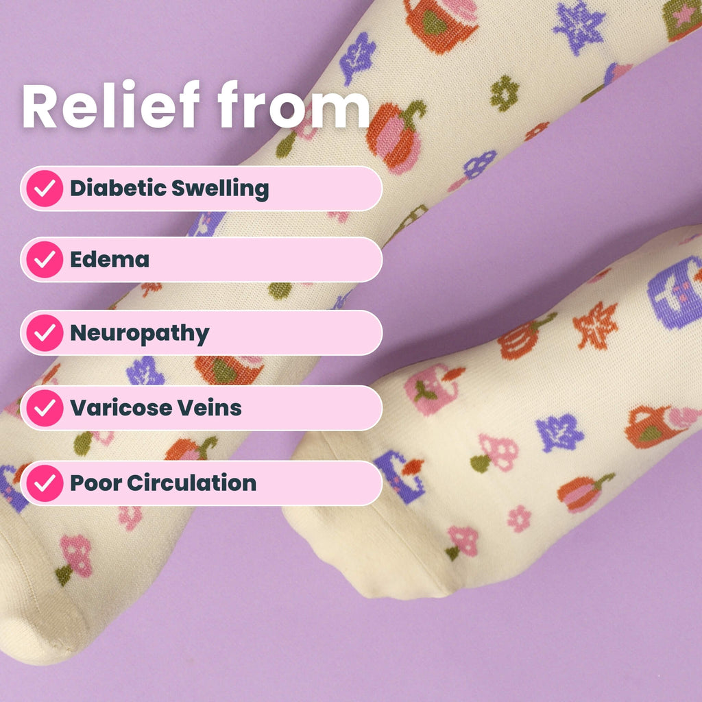 Beige compression socks with pumpkin spice pattern close up toes