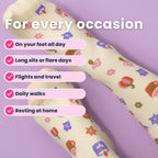 Beige compression socks with pumpkin spice pattern close up feet