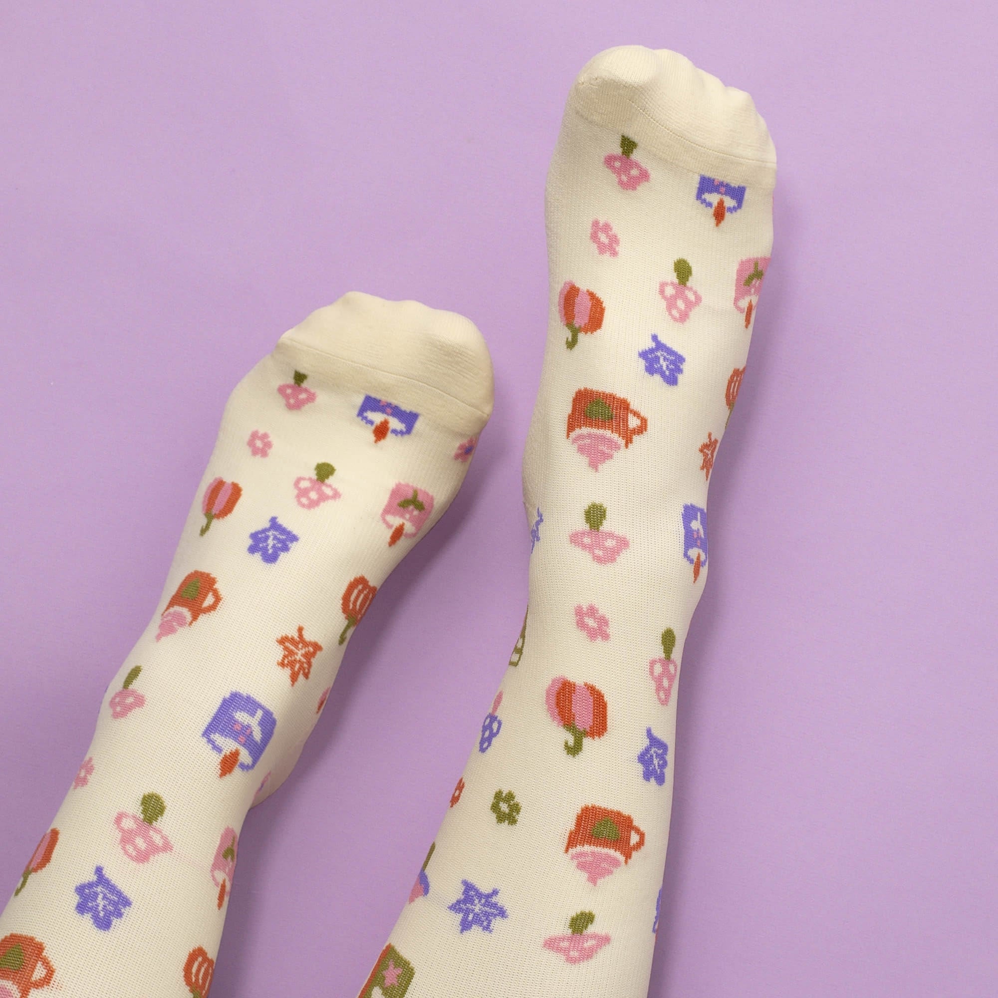 Beige compression socks with pumpkin spice pattern