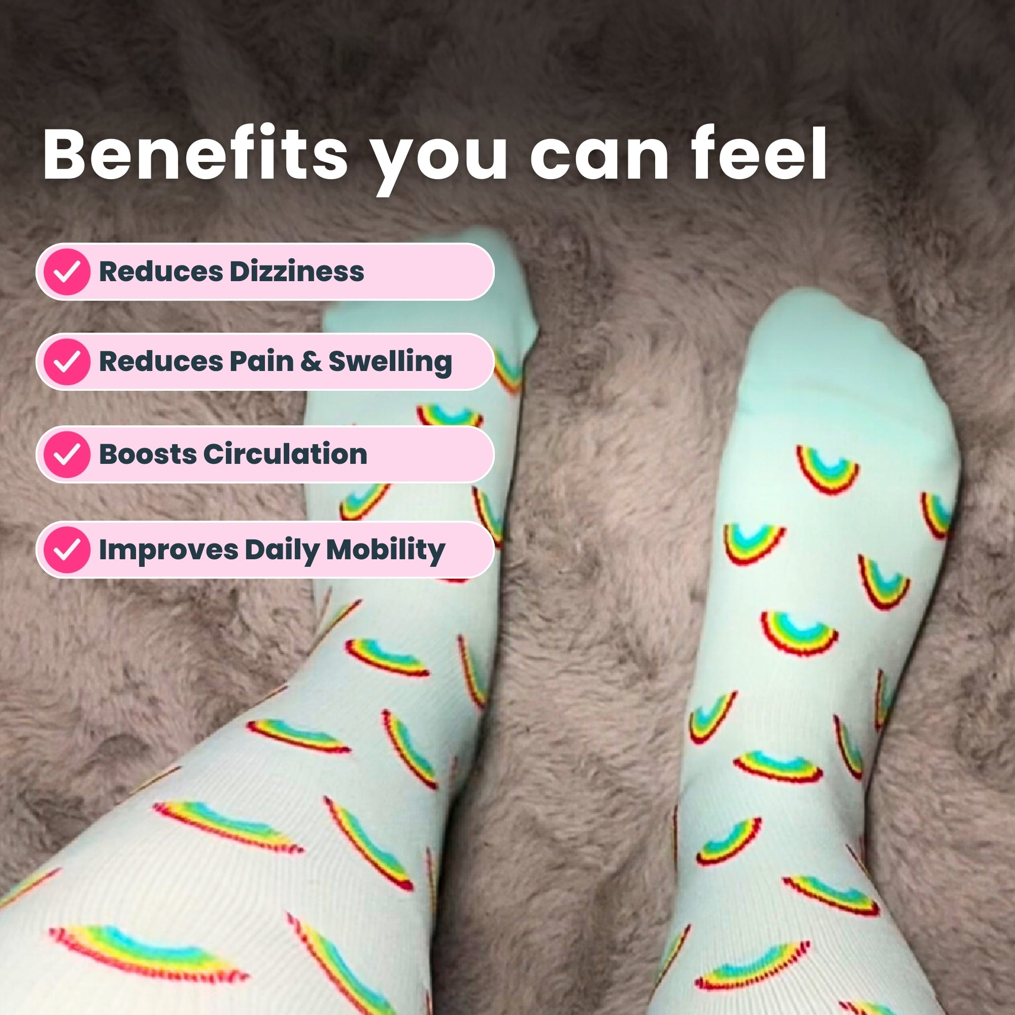 Legs wearing light blue compression socks with rainbow patterns 